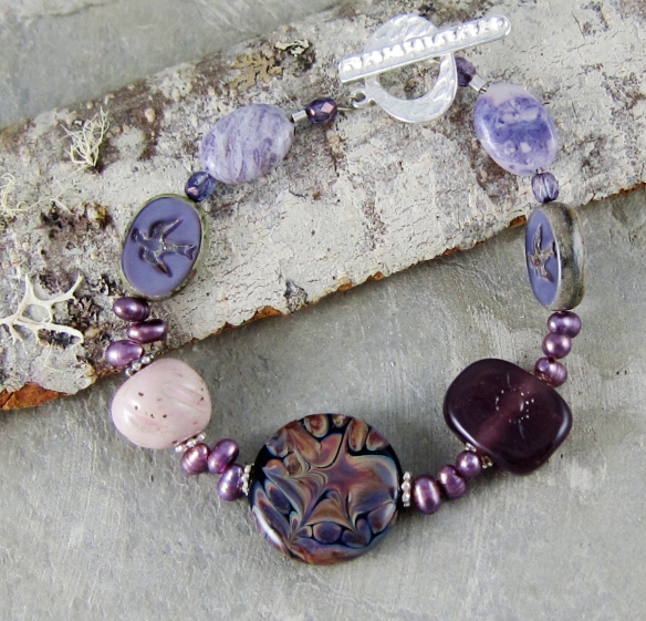 Purple lampwork bracelet by Linda Landig Jewelry
